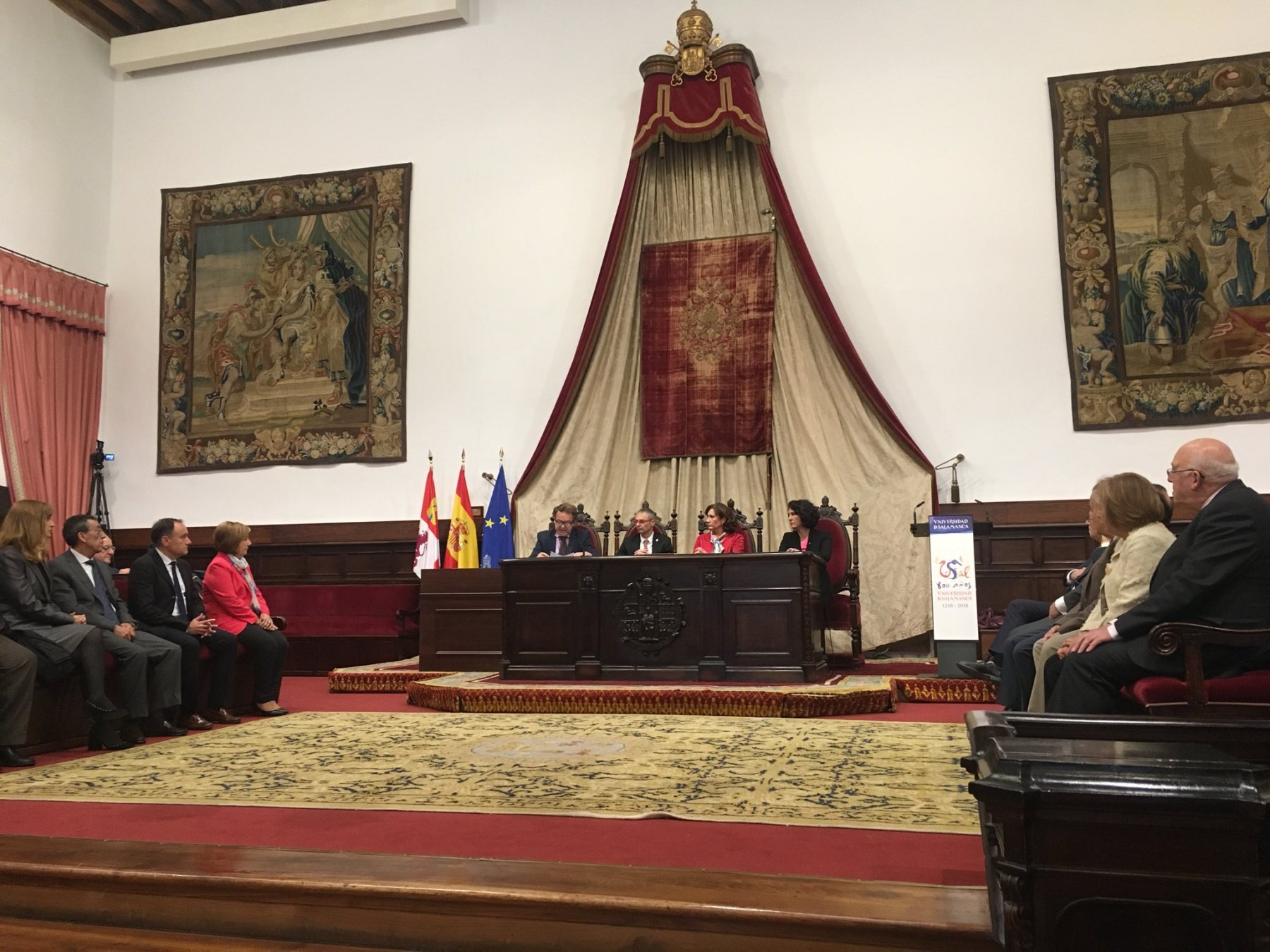 Diploma ceremony at the Paraninfo of the University of Salamanca, with UNESCO representatives and authorities present, celebrating the inscription of the Cajal Legacy in the Memory of the World.